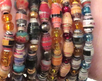 Variety of 10 Paper Bead Bracelets. Wholesale prices, recycled magazine paper beads. Upcycled magazine