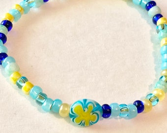 Blue and Yellow summer seed bead Bracelet. Yellow and Blue stretch cord bracelet. Millefiore beads. Custom size available.