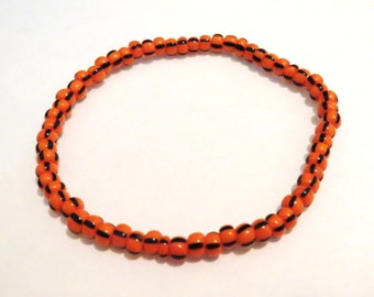 Orange and black seed bead stretch bracelet. Black and Orange striped bracelet. Tiger stripe Halloween seed bead bracelet Halloween bracelet