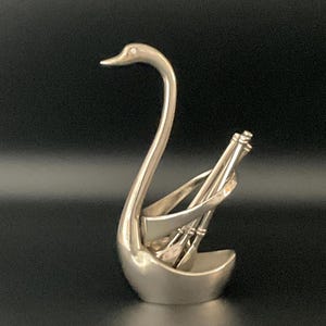 May include: A rustic wooden sign with the text "Welcome to our home" in a handwritten style. The sign features a distressed finish and a simple, inviting design, perfect for entryway decor.