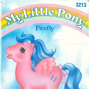 May include: A pink My Little Pony named Firefly with blue hair and a pink and white bow. The pony has a lightning bolt symbol on its flank and is standing on a cloud. The image is from a vintage sewing pattern by Butterick.
