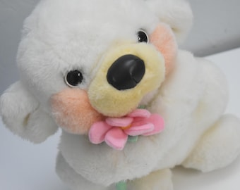 Commonwealth dog or bear with flower