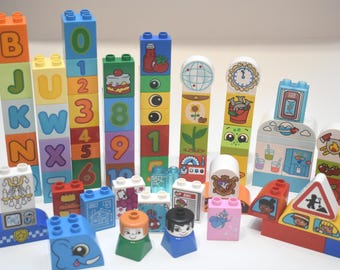 64 pieces Duplo assorted specialty bricks printed designs accessory blocks