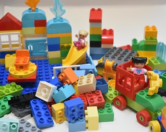 117 pieces Duplo assorted basic bricks and off brand blue base plate