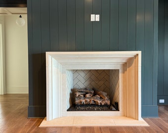 Cast stone surround for fireplace