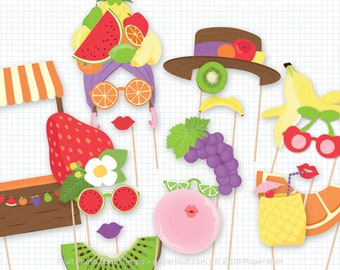 May include: A set of 10 fruit-themed photo booth props. The props include a watermelon slice, a banana, a pineapple, a strawberry, a kiwi, a grape bunch, a cherry, a lime, an orange slice, and a fruit stand. The props are printed on cardstock and have wooden sticks attached.