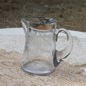 Etched Glass Syrup Dispenser with Metal Top and Hinged Lid, pitcher, purpled with age, vintage