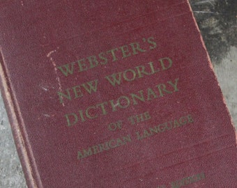 Webster's New World Dictionary of the American Language, copyright 1951, burgundy cover with faded gold lettering, vintage