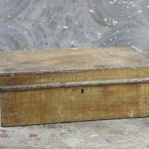 Exquisite Primitive Wooden Grain Painted Mustard Color Document Box, original paint and hinged with hand forged nails, circa late 1800s