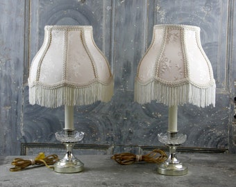 Two Antique Boudoir Lamps with Braided, Tasseled Shades with Floral Detail, Brass and Pressed Glass, in working condition