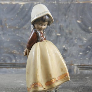 Early Lladro figurine of shy little girl