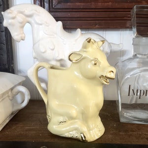 Pearl 635 Cow Creamer, trimmed with 22 kt gold, butter yellow color, made in USA, vintage