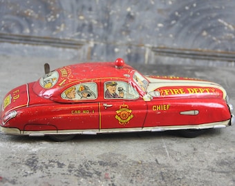 PRICE LOWERED!  Collectible Marx tin lithograph wind up Dick Tracy fire chief car No 1 with working light, vintage