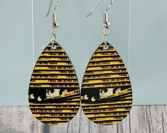 Crime scene tape with peeping eyes earrings