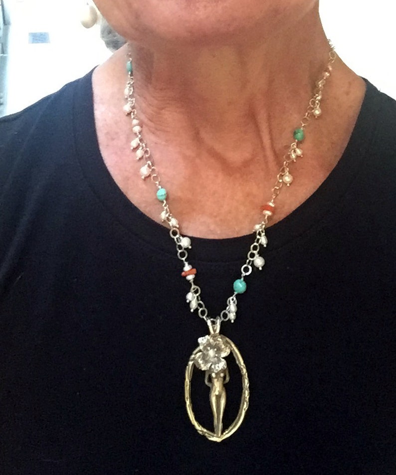 Kingman Turquoise and Natural Coral Sculptural Nude Figure with Flower in Sterling Silver with Freshwater Pearls