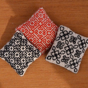 Blackwork Cushion, one inch scale dolls house pillow, hand embroidered dollhouse miniature in 1/12 scale image 1