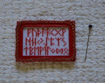 Framed hand embroidered red sampler, Rune sampler, dollhouse miniature in one inch scale