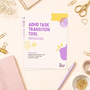 May include: A white document titled "ADHD Task Transition Tool" with purple text and decorative yellow and purple shapes. The document is surrounded by stationery items, including a pen, scissors, and paper clips.