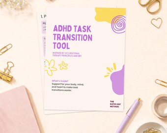 May include: A white document titled "ADHD Task Transition Tool" with purple text and decorative yellow and purple shapes. The document is surrounded by stationery items, including a pen, scissors, and paper clips.