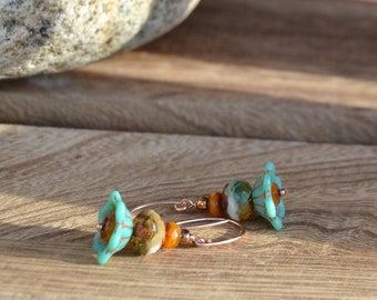 Turquoise Czech glass bellflower dangle earrings on rose gold.