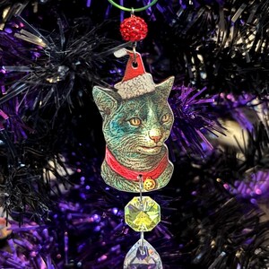 Adorno navideño de gato de Yule: atrapasol navideño de gato