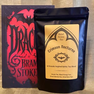 May include: A set of three ceramic mugs with a speckled, matte finish. The mugs are in shades of cream, light gray, and dark gray. Each mug has a simple, modern design and a rounded handle.