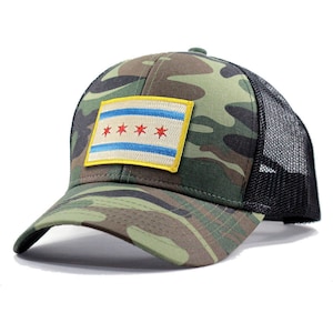 May include: Camouflage trucker hat with a black mesh back and a yellow patch featuring the Chicago flag with red stars.