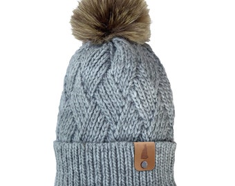 Women's Winter Hat Chunky Cable Knit Beanie New Hampshire Leather Patch Faux Fur Pom Pom