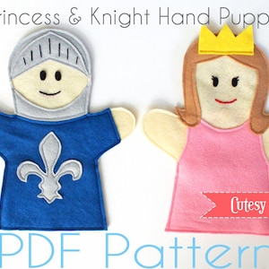 May include: PDF pattern for a princess and knight hand puppet set. The princess puppet is wearing a pink dress and a gold crown. The knight puppet is wearing blue armor with a silver fleur-de-lis. The pattern is from Cutesy Crafts.
