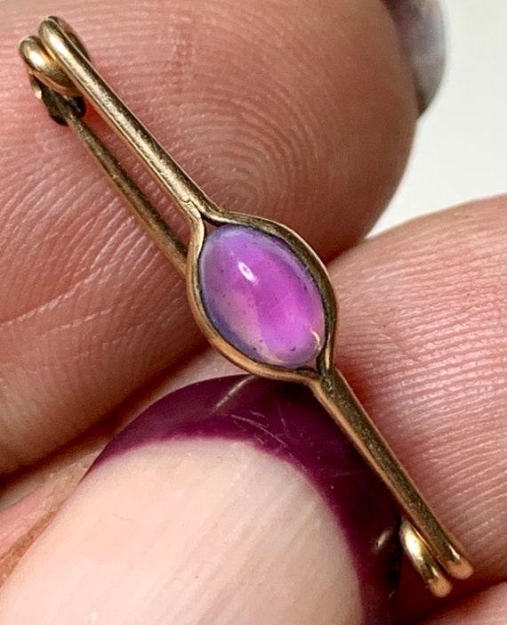 9k Gold Brooch. Dragons breath. Delicate safety pi