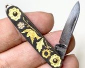 Damascene Bird, knife pendant. Composition Gold leaf. 1940 50s. Toledo, Spain. Vintage jewelry.