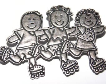 Vintage Sterling Silver Brooch:  Kids on Skates - Mexico .925