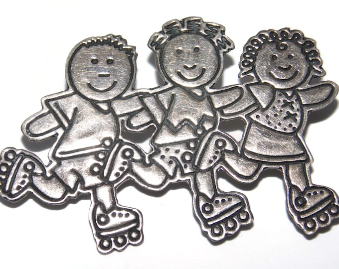Vintage Sterling Silver Brooch:  Kids on Skates - Mexico .925
