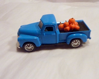 blue metal truck