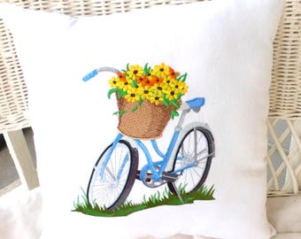 Broderad cykelkudde: Blå cykel med gula blommor