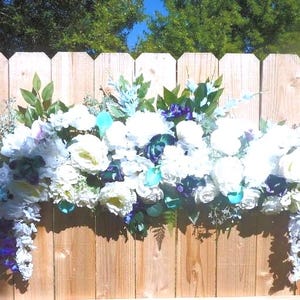 Silk Wedding Arch Flowers: Malibu Blue, Purple, and White Floral Swag