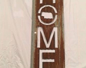 old rusted  corrugated barn tin home sign