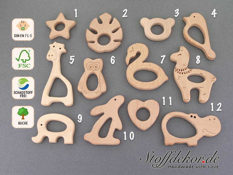 May include: Twelve wooden teethers in various animal shapes, including a giraffe, owl, flamingo, llama, bunny, and hippo. The teethers are made of natural beech wood and are safe for babies to chew on. DIN EN 71-3, FSC, Schadstoff Frei, Buche.