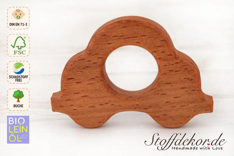 May include: A wooden car-shaped teether for babies. The teether is made of beech wood and is finished with natural oil. It is certified safe for babies and meets the DIN EN 71-3 safety standard.