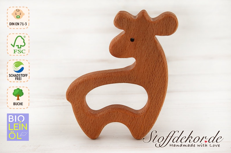 May include: Wooden deer-shaped teether for babies. The teether is made of natural beech wood and is finished with bio-based linseed oil. It is certified safe for babies and is free of harmful substances.