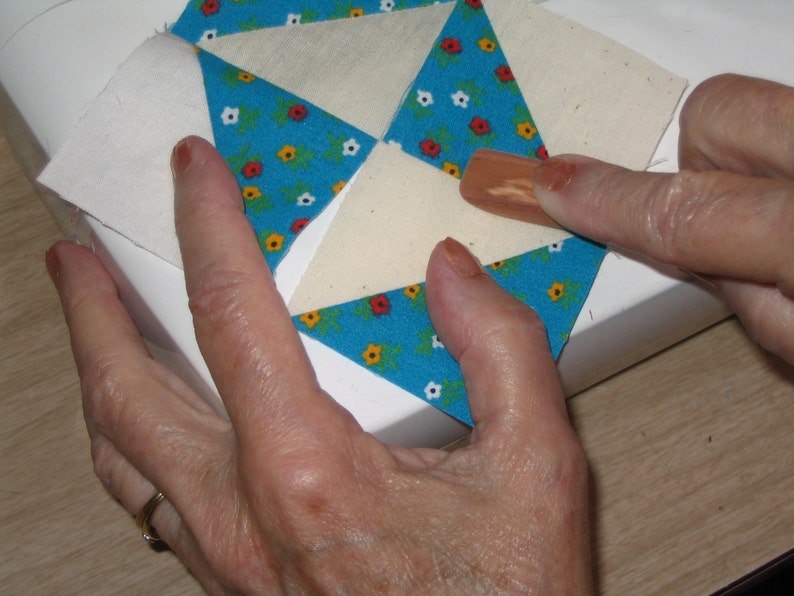 Cedar wooden iron for quilting. I like being able to sew my Etsy