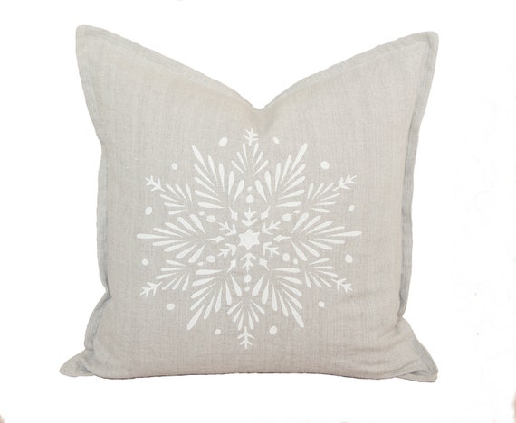 Linen throw pillow with a decorative Snowflake 20 inch Throw Pillow