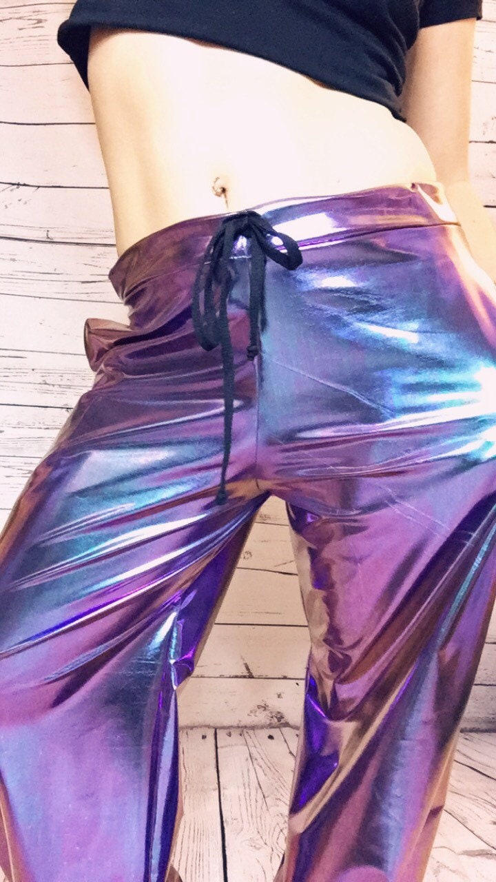 Woman\u2019s Purple and Teal Holographic Space Pants
