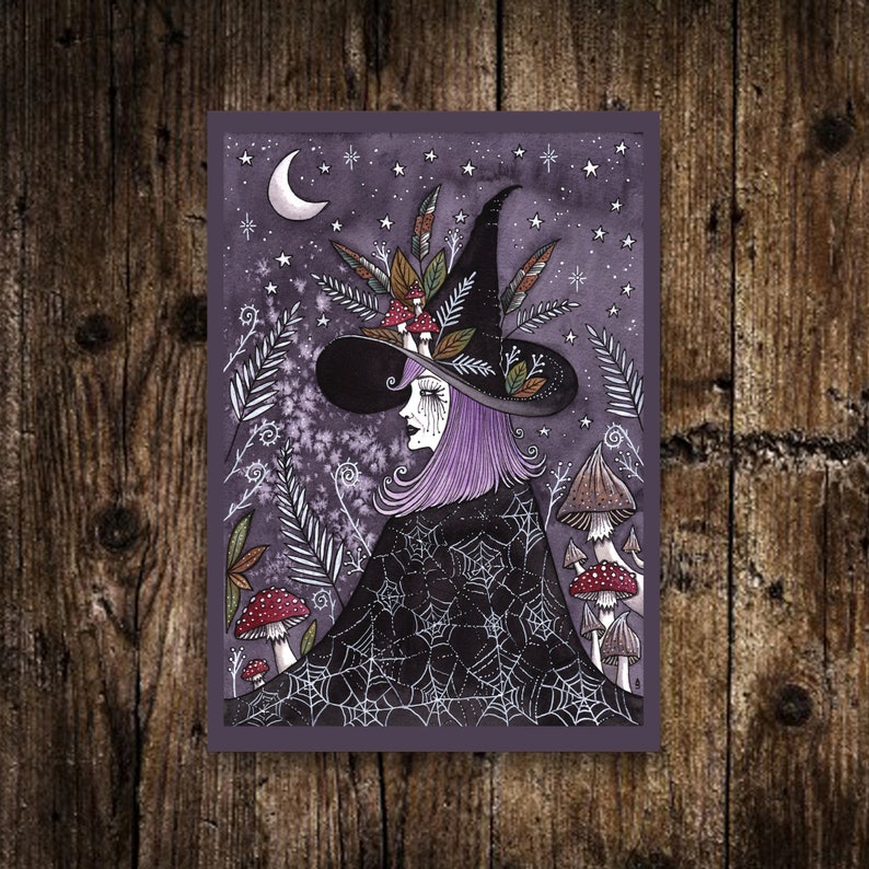 May include: A purple-haired witch with a black hat adorned with feathers and mushrooms stands in a woodland setting. The background is a dark purple with white stars and a crescent moon. The witch is wearing a black cloak with a spiderweb pattern.