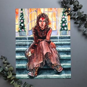 May include: Watercolor illustration of a person sitting on steps, with blood on their face and clothing. They are holding a cigarette and a pack of cigarettes. The background shows a burning building and two topiary trees.