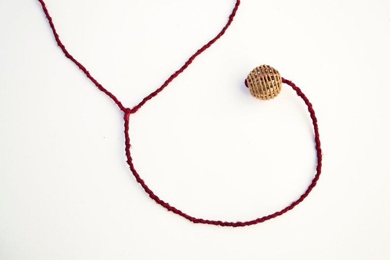 Burgundy Pendulum Necklace with Brass Bead. Fiber Jewelry. Fiber Necklace. Hand-Dyed Silk. Silk Necklace. Fair Trade Bead. Lariat Necklace. image 3