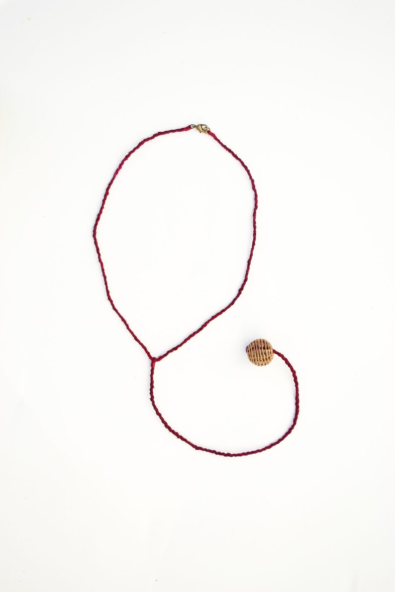 Burgundy Pendulum Necklace with Brass Bead. Fiber Jewelry. Fiber Necklace. Hand-Dyed Silk. Silk Necklace. Fair Trade Bead. Lariat Necklace. image 1
