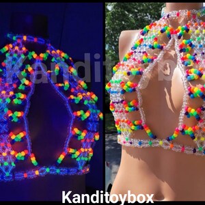 May include: A halter-style top constructed from clear and multi-colored neon plastic beads, featuring a high neck and a cut-out design. The beads glow under ultraviolet light, and the text Kanditoybox is visible on the image.