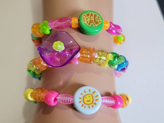 I had a wrist full of those colourful plastic bracelets, I loved the  glittery ones! : r/90s