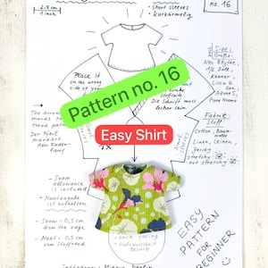 Könnte beinhalten: Ein Schnittmusterbogen mit dem Titel Easy Pattern Shirt Pattern no. 16, handgezeichneten Diagrammen, Anleitungen auf Englisch und Deutsch sowie einem kleinen grünen Shirt mit rosa-blauem Blumenmuster. Enthält eine 2,5 cm Skala.